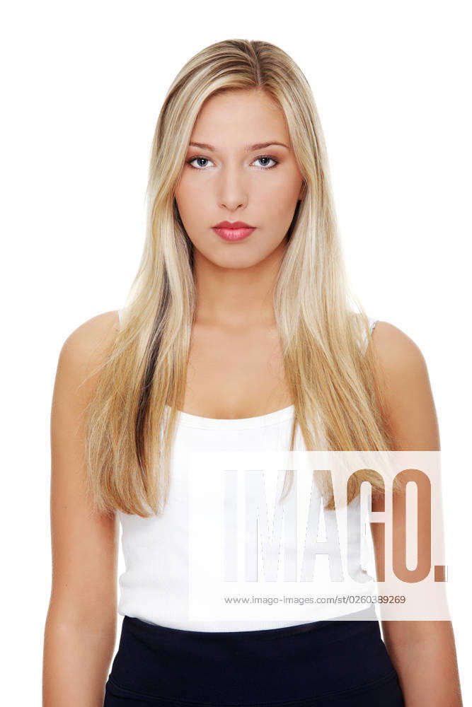 Portrait of a young business woman standing against white background
