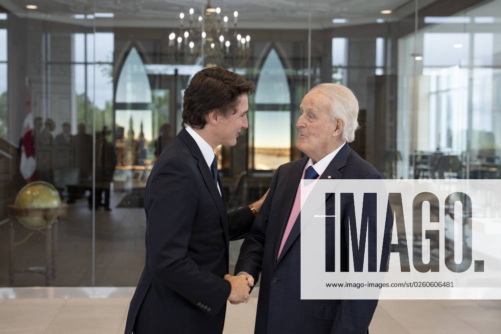 Former prime minister Brian Mulroney, right, greets Prime Minister Justin Trudeau in Mulroney Hall at St. Francis Xavier University in Antigonish, N.S. on Monday, June 19, 2023. Antigonish Canada - ZUMAc35_ 20230619_zaf_c35_071