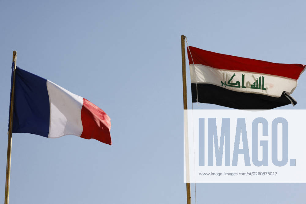 French President Emmanuel Macron in Baghdad - Iraq The national flags of Iraq (R) and France flutter at the presidential palace during an official welcoming ceremony for French President Emmanuel Macron in Baghdad on August 28, 2021. - Macron is among leaders set to attend a regional summit today in Iraq, with the Taliban s takeover of Afghanistan and a deadly jihadist attack in Kabul overshadowing the meeting. Photo by Ludovic Marin pool ABACAPRESS;COM Baghdad Iraq