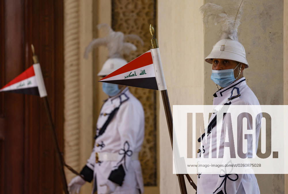 French President Emmanuel Macron in Baghdad - Iraq Iraqi honour guard hold national flags during an official welcoming ceremony for French President Emmanuel Macron in Baghdad on August 28, 2021. - Macron is among leaders set to attend a regional summit today in Iraq, with the Taliban s takeover of Afghanistan and a deadly jihadist attack in Kabul overshadowing the meeting. Photo by Ludovic Marin pool ABACAPRESS;COM Baghdad Iraq