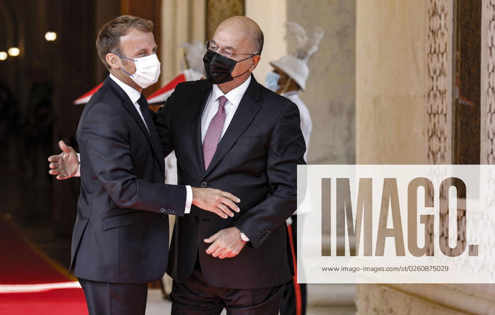 French President Emmanuel Macron in Baghdad - Iraq Iraqi President Barham Saleh (R) welcomes his French countepart Emmanuel Macron at the presidential palace in Baghdad on August 28, 2021. - Macron is among leaders set to attend a regional summit today in Iraq, with the Taliban s takeover of Afghanistan and a deadly jihadist attack in Kabul overshadowing the meeting. Photo by Ludovic Marin pool ABACAPRESS;COM Baghdad Iraq