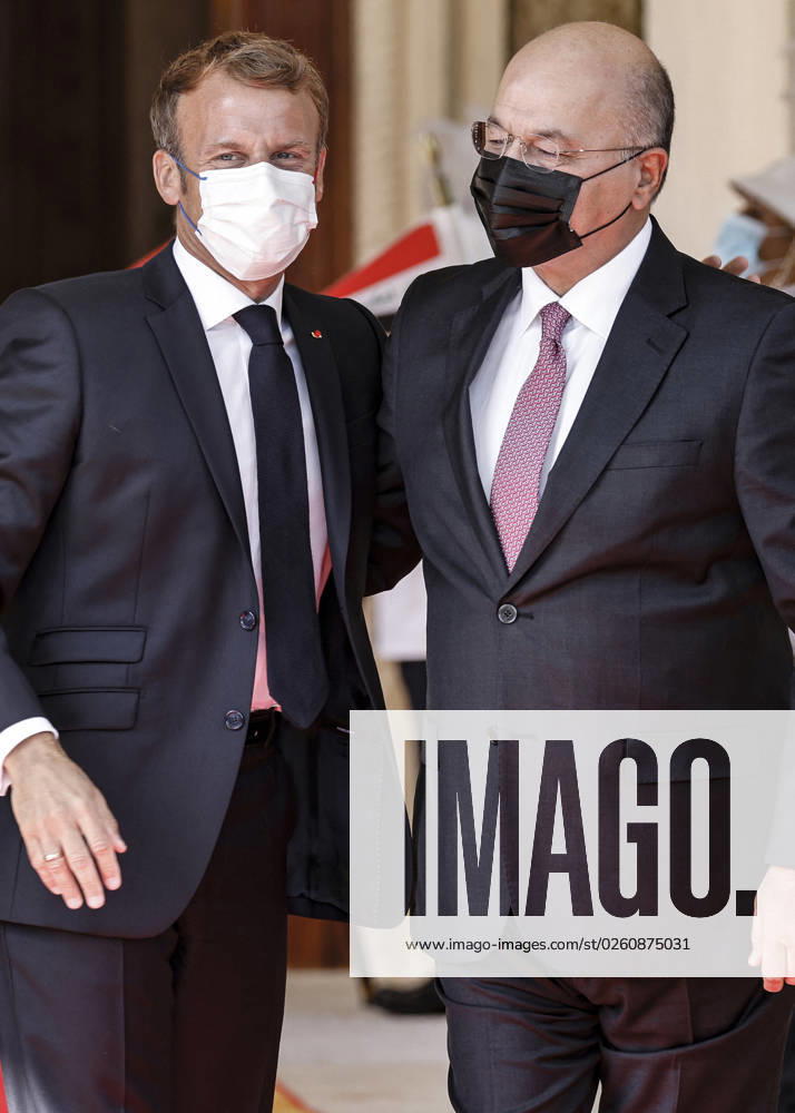 French President Emmanuel Macron in Baghdad - Iraq Iraqi President Barham Saleh (R) welcomes his French counterpart Emmanuel Macron in Baghdad on August 28, 2021. - Macron is among leaders set to attend a regional summit today in Iraq, with the Taliban s takeover of Afghanistan and a deadly jihadist attack in Kabul overshadowing the meeting. Photo by Ludovic Marin pool ABACAPRESS;COM Baghdad Iraq