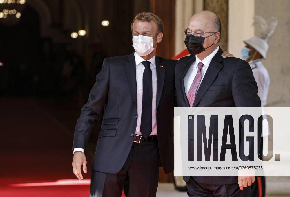 French President Emmanuel Macron in Baghdad - Iraq Iraqi President Barham Saleh (R) welcomes his French countepart Emmanuel Macron in Baghdad on August 28, 2021. - Macron is among leaders set to attend a regional summit today in Iraq, with the Taliban s takeover of Afghanistan and a deadly jihadist attack in Kabul overshadowing the meeting. Photo by Ludovic Marin pool ABACAPRESS;COM Baghdad Iraq