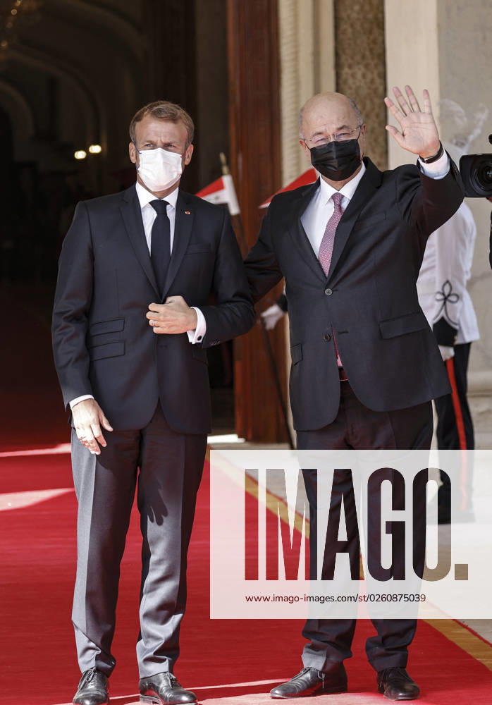 French President Emmanuel Macron in Baghdad - Iraq Iraqi President Barham Saleh (R) welcomes his French counterpart Emmanuel Macron in Baghdad on August 28, 2021. - Macron is among leaders set to attend a regional summit today in Iraq, with the Taliban s takeover of Afghanistan and a deadly jihadist attack in Kabul overshadowing the meeting. Photo by Ludovic Marin pool ABACAPRESS;COM Baghdad Iraq
