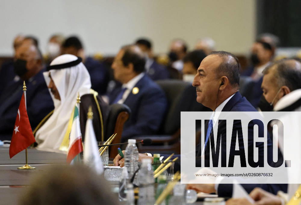 French President Emmanuel Macron in Baghdad - Iraq Turkey s Foreign Minister Mevlut Cavusoglu (R) attends the Baghdad conference in the Iraqi capital on August 28, 2021. (Photo by Ludovic MARIN POOL ABACAPRESS.COM Baghdad Iraq