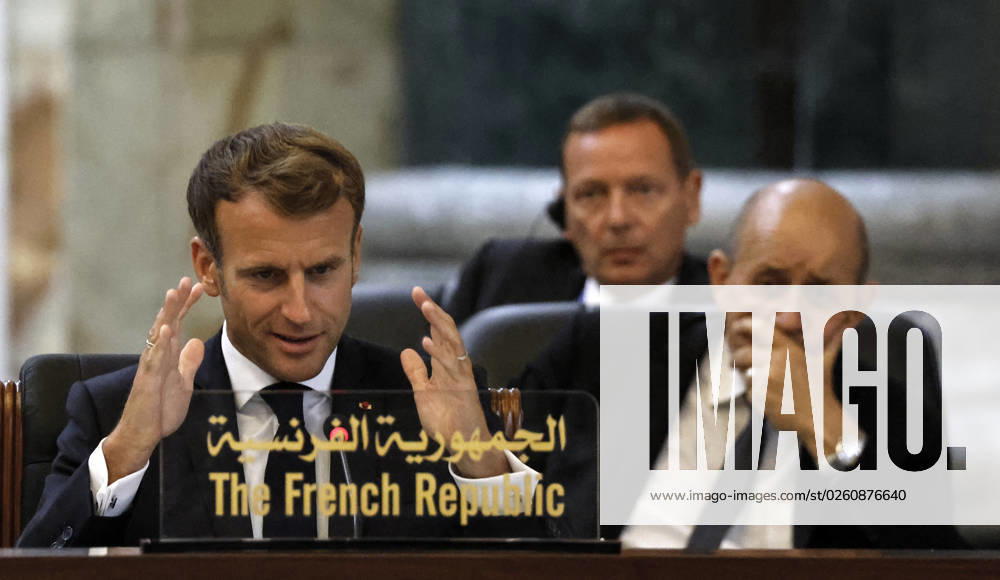 French President Emmanuel Macron in Baghdad - Iraq French President Emmanuel Macron speaks, accompanied by French Foreign Affairs Minister Jean-Yves Le Drian (R), during the Baghdad conference in the Iraqi capital on August 28, 2021. (Photo by Ludovic MARIN POOL ABACAPRESS.COM Baghdad Iraq