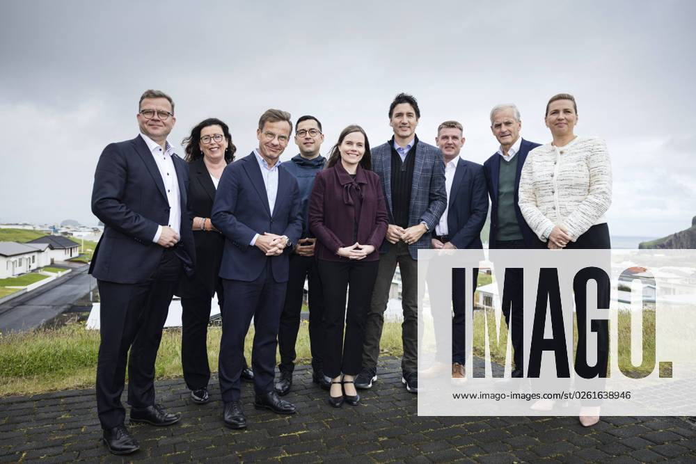 Prime Minister Petteri Orpo (L) of Finland, Premier of Aland Veronica Thornroos, Prime Minister Ulf Kristersson of Sweden, Prime Minister Mute Bourup Egede of Greenland, Prime Minister Katrin Jakobsdottir of Iceland, Prime Minister Justin Trudeau, Faroese Prime Minister Aksel V Johannesen, Prime Minister Jonas Gahr Stoere of Norway and Prime Minister Mette Frederiksen (R) of Denmark pose while attending the annual summer meeting of the Nordic Prime Ministers in Vestmannaeyjar, Iceland, on June 26, 2023. Vestmannaeyjar, Westman Islands Iceland