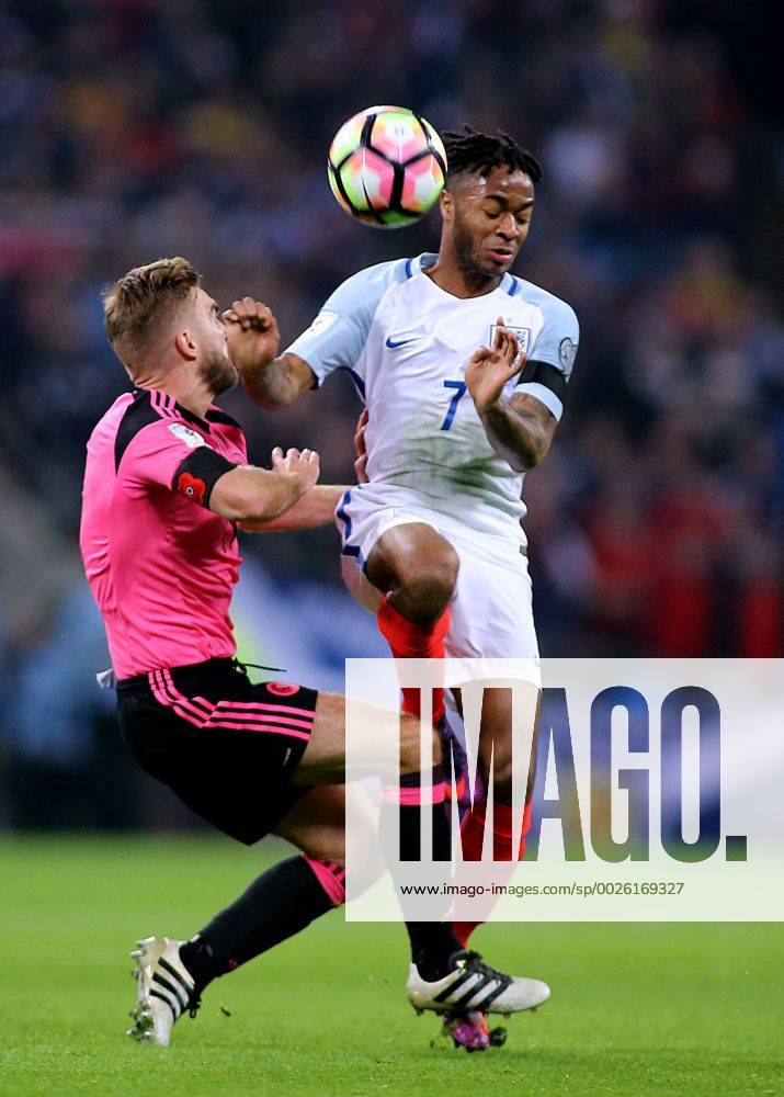 - SPORT 11.11.2016. Wembley Stadium, London, England. World Cup Qualifying Football. England versus Scotland. Raheem Sterling of England clashes with James Morrison of Scotland during a challenge Kertonx ActionPlus11808493