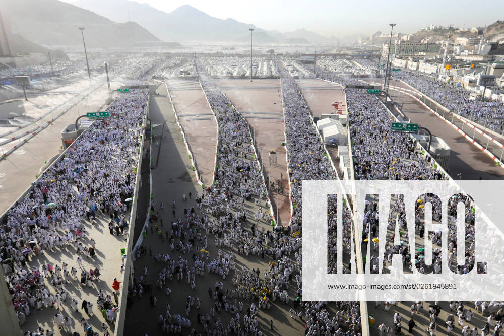 Muslim worshippers make their way to cast stones as part of a symbolic stoning of the devil ritual, during the Hajj pilgrimage in Mina, near Saudi Arabia s holy city of Mecca Muslim worshippers make their way to cast stones as part of a symbolic stoning of the devil ritual, during the Hajj pilgrimage in Mina, near Saudi Arabia s holy city of Mecca on June 28, 2023. From first light, small groups of pilgrims made their way across the Valley of Mina near Mecca in western Saudi Arabia to symbolically humiliate the devil at the Jamrah al-Aqaba mosque. Photo by Ashraf Amra apaimages Mina Mina Saudi Arabia 280623_MINA_APA_00 (78)