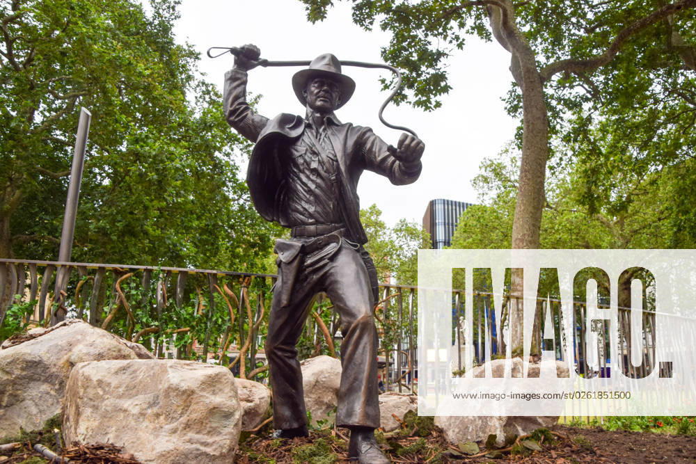 A new sculpture of Indiana Jones has been unveiled in Leicester Square, part of the permanent statue trail Scenes In The Square featuring famous film characters. The unveiling of the statue coincides with the UK opening of Indiana Jones and the Dial of Destiny. London United Kingdom - ZUMAv130 20230628_zip_v130_007