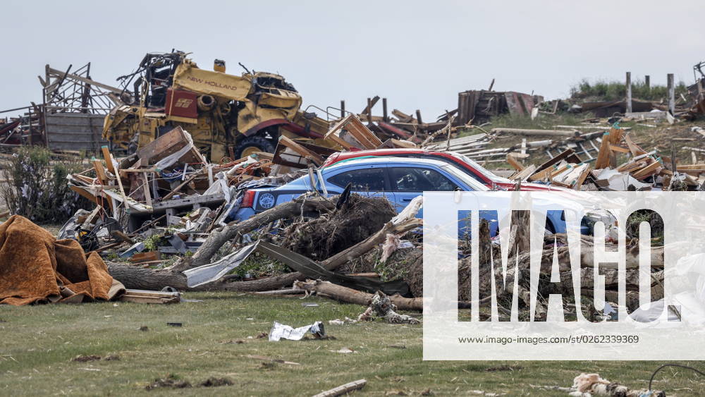 Vehicles sit amidst a tornado damaged home near Carstairs, Alta., Saturday, July 1, 2023. No injuries were reported. Carstairs CANADA - ZUMAc35_ 20230701_zaf_c35_138