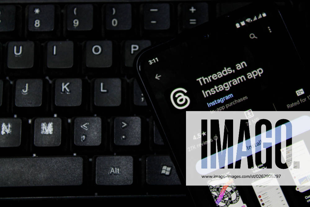 In this photo illustration, Threads logo seen displayed on a smartphone and a keyboard in the background. Threads is the new social network from Meta Platforms which was launched on the 5th of July 2023. According to Meta CEO Mark Zuckerberg, the Threads app is designed to rival Twitter. As of 6th of July 2023, the Thread app already has 10 million users. Bandung Indonesia - ZUMAs281 20230707_zip_s281_005