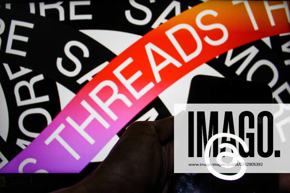 In this photo illustration, Threads logo seen displayed on a smartphone and a threads logo in the background. Threads is the new social network from Meta Platforms which was launched on the 5th of July 2023. According to Meta CEO Mark Zuckerberg, the Threads app is designed to rival Twitter. As of 6th of July 2023, the Thread app already has 10 million users. Bandung Indonesia - ZUMAs281 20230707_zip_s281_013