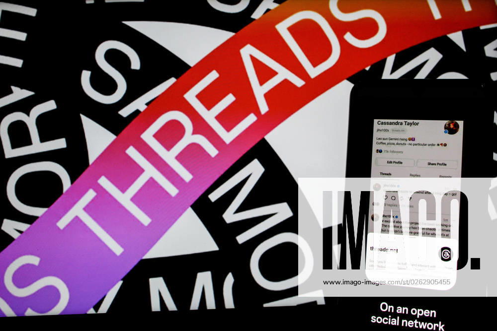 In this photo illustration, Threads logo seen displayed on a smartphone and a threads logo in the background. Threads is the new social network from Meta Platforms which was launched on the 5th of July 2023. According to Meta CEO Mark Zuckerberg, the Threads app is designed to rival Twitter. As of 6th of July 2023, the Thread app already has 10 million users. Bandung Indonesia - ZUMAs281 20230707_zip_s281_018