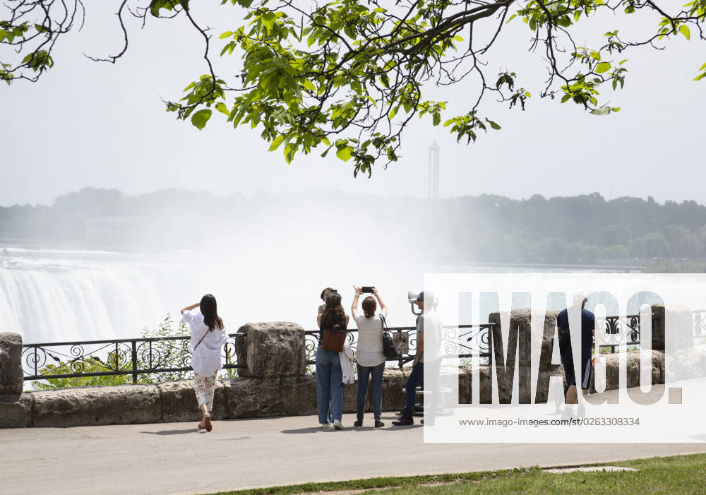 July 10, 2023. Niagara Falls is composed of three waterfalls at the Southern end of the Niagara River Gorge. It drains Lake Erie into Lake Ontario and defines the United States Canada border between the twin cities of Niagara Falls, Ontario and Niagara Falls, New York. Horseshoe Falls is nearest the Canadian shore and can be seen from the walk along the shoreline in Niagara Park. Niagara Fallas Canada - ZUMAl92_ 20230708_zaf_l92_018