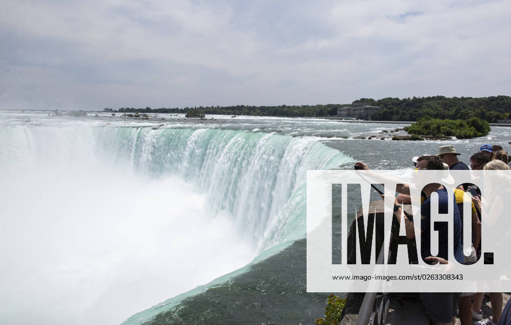 July 10, 2023. Niagara Falls is composed of three waterfalls at the Southern end of the Niagara River Gorge. It drains Lake Erie into Lake Ontario and defines the United States Canada border between the twin cities of Niagara Falls, Ontario and Niagara Falls, New York. Horseshoe Falls is nearest the Canadian shore and can be seen from the walk along the shoreline in Niagara Park. Niagara Fallas Canada - ZUMAl92_ 20230708_zaf_l92_021