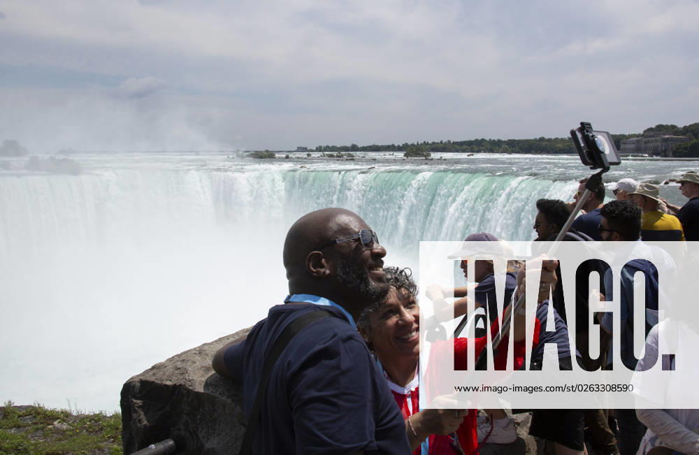 July 10, 2023. Niagara Falls is composed of three waterfalls at the Southern end of the Niagara River Gorge. It drains Lake Erie into Lake Ontario and defines the United States Canada border between the twin cities of Niagara Falls, Ontario and Niagara Falls, New York. Horseshoe Falls is nearest the Canadian shore and can be seen from the walk along the shoreline in Niagara Park. Niagara Fallas Canada - ZUMAl92_ 20230708_zaf_l92_031