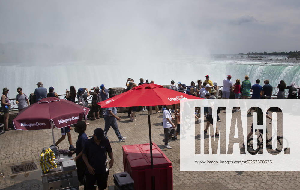July 10, 2023. Niagara Falls is composed of three waterfalls at the Southern end of the Niagara River Gorge. It drains Lake Erie into Lake Ontario and defines the United States Canada border between the twin cities of Niagara Falls, Ontario and Niagara Falls, New York. Horseshoe Falls is nearest the Canadian shore and can be seen from the walk along the shoreline in Niagara Park. Niagara Fallas Canada - ZUMAl92_ 20230708_zaf_l92_034