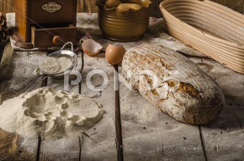 Homemade rustic bread, baked in oven, wheat leaven, breaded in a basket bread, bakery, food, fresh, background, wheat, loaf, organic, flour, grain, wooden, table, whole, white, baking, healthy, bake, meal, rustic, breads, brown, dough, breakfast, agriculture, eating, rye, closeup, dark, traditional, baked, wood, homemade, isolated, baguette, gourmet, natural, pastry, diet, seed, oat, black, basket, bread basket, wheat leaven, rustic, organic, bio, eggs, bakery, oven