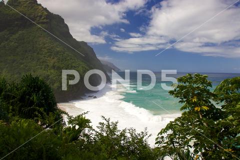 Hanakapiai Beach along Kalalau Hiking Trail on the Hawaiian island of Kauai Hanakapiai, beach, hawaii, hiking, trail, napali, danger, surf, waves, recreation, copy space, kauai, kalalau, island, jungle, nature, coast, landscape, tropical, path, outdoor, pali, na, vacation, scenic, scenery, beautiful, green, summer, holiday, travel, leisure, tourism, adventure, paradise, coastline, plant, narrow, experience, day, daylight, usa, united states, America