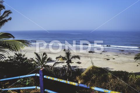 Panorama landscape view of a beautiful tropical sea beach in summertime during christmas holiday. ( MUMBAI, MAHARASTRA, INDIA). Travel vacation and holiday concept. ocean, wave, clear-sky, water, background, sand, nature, beauty, outdoor, coast, foam, sun, shore, cloud, surf, scenic, relax, blue, sandy, turquoise, tranquil, paradise, tropic, nobody, sunshine, natural, horizon, sunlight, splash, south, exotic-bay, amazing, italy, seaside, portugal, coconut, idyllic-place, lagoon, coastline, relaxation, wonderful, seashore, scenery-calm, sea-beach, coastal, tropical, marine, aqua, wavy, shoreline