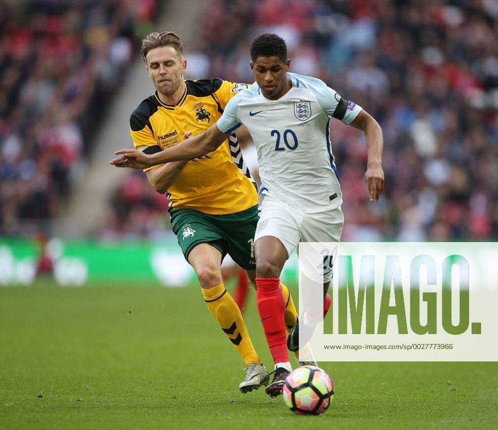 England s Marcus Rashford tussles with Lithuania s Arturas Zulpa during the World Cup Qualifying match at Wembley Stadium, London. Picture date: March 26th, 2017. Pic credit should read: David Klein Sportimage .