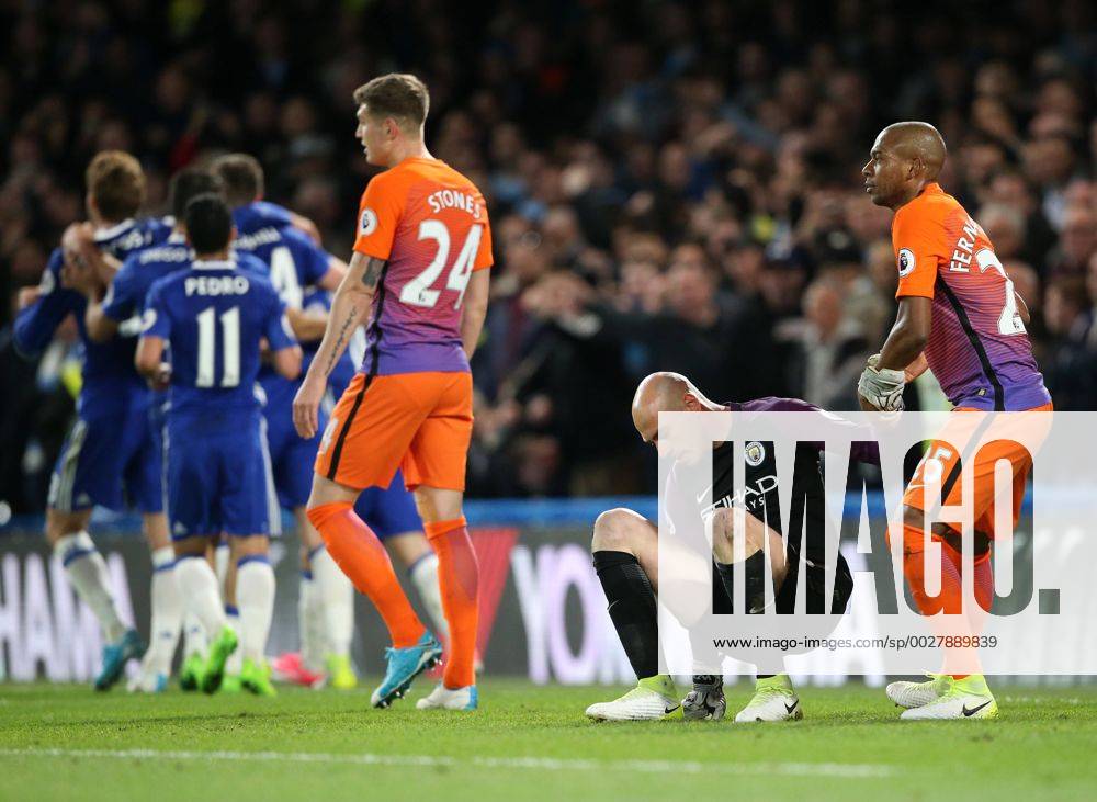 Chelsea s Eden Hazard celebrates scoring his sides second goal as Manchester City s Willy Caballero looks on dejected during the Premier League match at the Stamford Bridge Stadium, London. Picture date: April 5th, 2017. Pic credit should read: David Klein Sportimage .