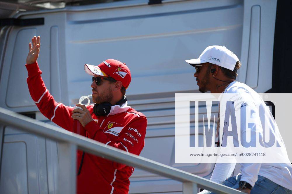 Russian Grand Prix, Sochi 27 - 30 April 2017 30.04.2017 - Sebastian Vettel (GER) Scuderia Ferrari SF70H and Lewis Hamilton (GBR) Mercedes AMG F1 W08 at drivers parade
