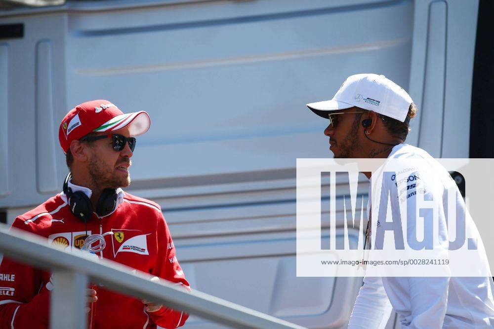 Russian Grand Prix, Sochi 27 - 30 April 2017 30.04.2017 - Sebastian Vettel (GER) Scuderia Ferrari SF70H and Lewis Hamilton (GBR) Mercedes AMG F1 W08 at drivers parade
