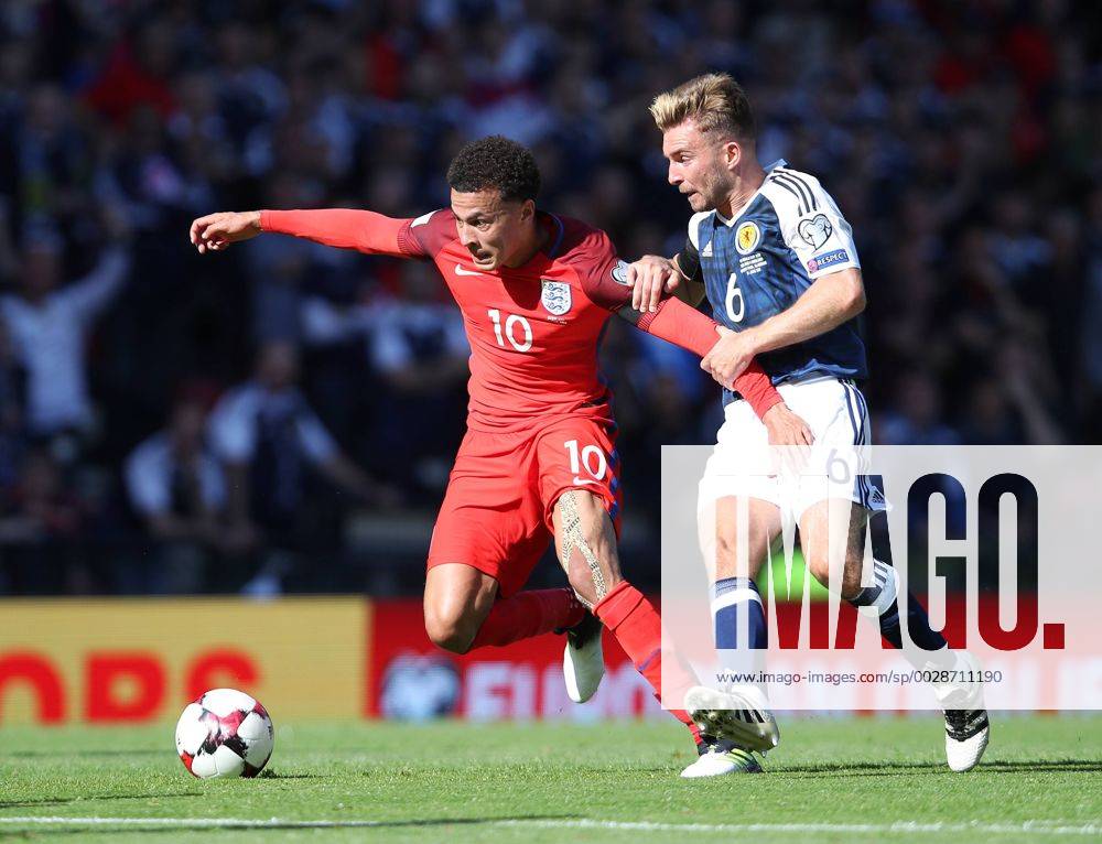 Scotland s James Morrison tussles with England s Dele Alli during the FIFA World Cup WM Weltmeisterschaft Fussball Qualifying match at Hampden Park Stadium, Glasgow Picture date 10th June 2017. Picture credit should read: David Klein Sportimage .