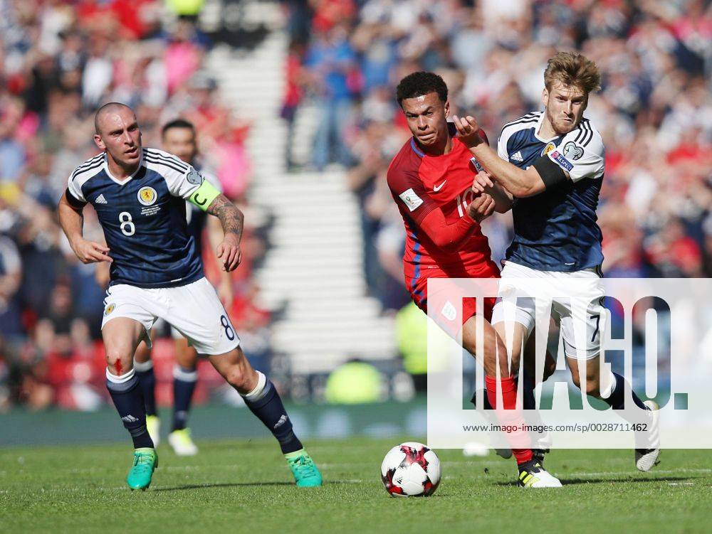 Scotland s Stuart Armstrong tussles with England s Dele Alli during the FIFA World Cup WM Weltmeisterschaft Fussball Qualifying match at Hampden Park Stadium, Glasgow Picture date 10th June 2017. Picture credit should read: David Klein Sportimage .