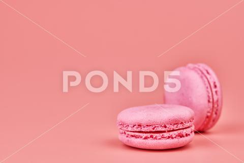 Macaroons on pink background. Colorful small cookie from ground almonds and coconut. Popular confectionery. Tasty snack food for take away, copy space macaroons, macaroon, macaron, pink, colorful, confectionery, cookie, popular, copy space, cake, pastry, cupcake, shortcake, tasty, food, design, snack, take, away, ground, almonds, coconut, small, red, studio, bunch, green, beige, dessert, pastel, different, assorted, cuisine, cafe, vintage, bakery, candy, sweet, french, sandwich, color, desert, sweetness, honey, goody, flavor, gourmet, breakfast, high-calorie, delicious