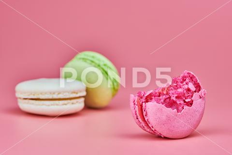 Macaroons on pink background. Colorful small cookie from ground almonds and coconut. Popular confectionery. Tasty snack food for take away, copy space macaroons, macaroon, macaron, pink, colorful, confectionery, cookie, popular, copy space, cake, pastry, cupcake, shortcake, tasty, food, design, snack, take, away, ground, almonds, coconut, small, red, studio, bunch, green, beige, dessert, pastel, different, assorted, cuisine, cafe, vintage, bakery, candy, sweet, french, sandwich, color, desert, sweetness, honey, goody, flavor, gourmet, breakfast, high-calorie, delicious