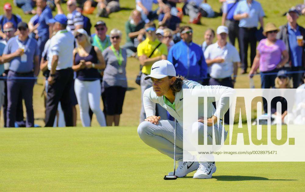 July 8th 2017, Portstewart Golf Club, Portstewart, Northern Ireland; Dubai Duty Free Irish Open Golf Championship, Day 3; Tommy Fleetwood (ENG) studies the green on the 16th during the third round of the Dubai Duty Free Irish Open Cookex ActionPlus11898991
