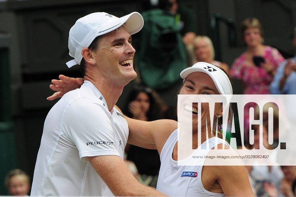 Tennis - 2017 Wimbledon Championships - Week Two, Sunday Day Thirteen Mixed Doubles Final match Jamie Murray (GBR) and Martina Hingis (SUI) vs Henri Kontinen (FIN) and Heather Watson (GBR) Jamie Murray and Martina Hingis celebrate winning the match on Centre court COLORSPORT ANDREW COWIE