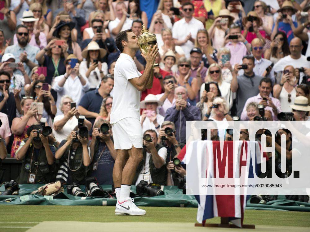 LONDON, ENG - JULY 16: Roger Federer (SUI) poses with the trophy after winning men s singles title during the Wimbledon Championships at the All England Lawn Tennis and Croquet Club in London, England. (Photo by Cynthia Lum Icon Sportswire) TENNIS: JUL 16 Wimbledon Icon250170716005