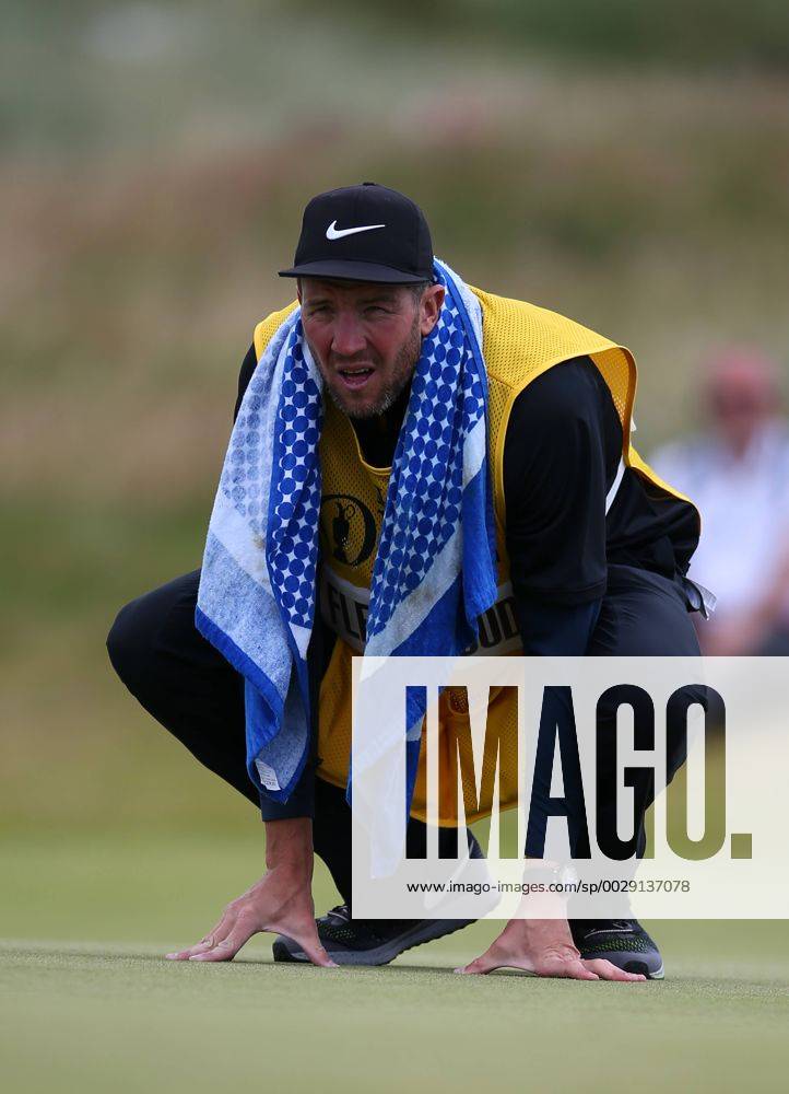 20th July 2017, Royal Birkdale Golf Club, Southport, England; The 146th Open Golf Championship, First round; Ian Finnis studies the line of the birdie putt of Tommy Fleetwood (ENG) on the 15th green Blunsdenx ActionPlus11904161