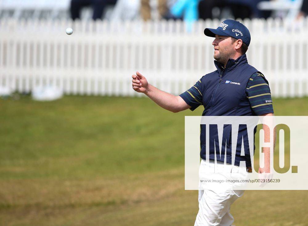 22nd July 2017, Royal Birkdale Golf Club, Southport, England; The 146th Open Golf Championship, third round ; Branden Grace (RSA) throws his golf ball to his caddie after completing his historic low round of 62 in an Open Championship Blunsdenx ActionPlus11904865