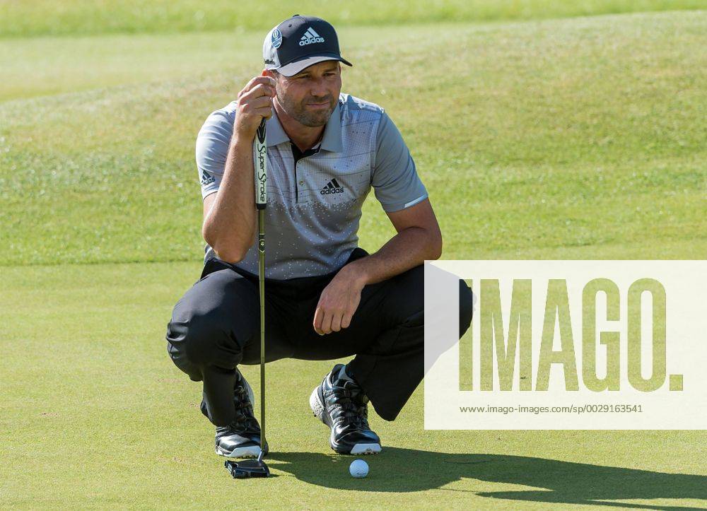 22nd July 2017, Royal Birkdale Golf Club, Southport, England; The 146th Open Golf Championship, third round ; Sergio Garcia (ESP) crouches to line up his putt on the 18th green Blunsdenx ActionPlus11905239