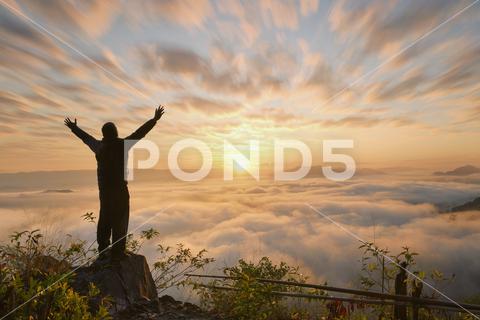 Adventure hiking, mountian landscape with tourist on during sunrise nature, adventure, mountain, travel, person, woman, sky, trekking, forest, hiking, landscape, morning, outdoor, success, explore, sunshine, enjoyment, freedom, stretching, sun, trekker, backpack, backpacker, climbing, hiker, peak, summer, awe, horizontal, silhouette, thinking, hold, hands, step, climber, photography, color image, clouds, tourist, adventure hiking, cloud - sky, dramatic landscape, high land, trail, autumn, environment, hill, stone, top, atmospheric mood