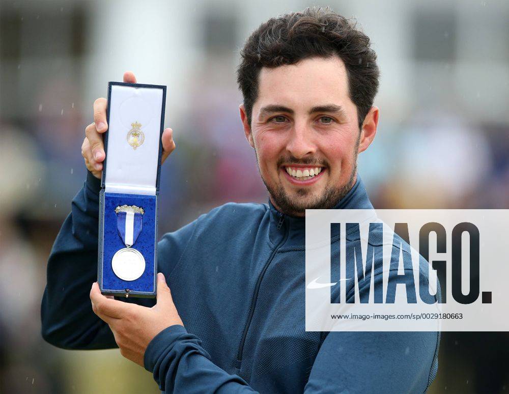 23rd July 2017, Royal Birkdale Golf Club, Southport, England; The 146th Open Golf Championship, fourth round ; Alfie Plant (amateur) (ENG) smiles as he holds the Silver Medal awarded to the highest placed amateur golfer Blunsdenx ActionPlus11905791