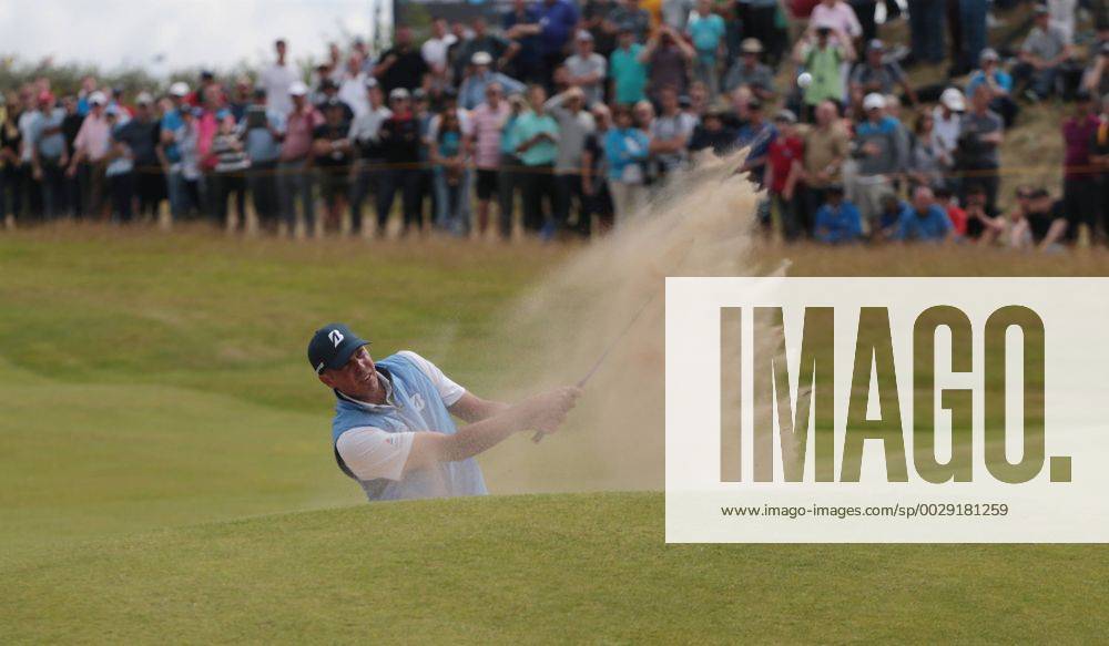 American Matt Kuchar hits out of the bunker on the 3rd hole on the final day of the 146th Open Championship at Royal Birkdale Golf Club, Southport on July 23, 2017. Spieth beat Kuchar with a combined score of 268, twelve under par. LON2017072333 HUGOxPHILPOTT