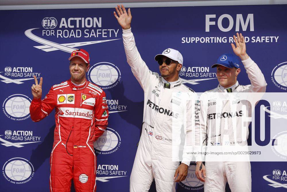 (Left to Right) Sebastian Vettel of Germany and Scuderia Ferrari, Lewis Hamilton of Great Britain and Mercedes AMG Petronas F1 Team and Valtteri Bottas of Finland and Mercedes AMG Petronas F1 Team during the Formula 1 Grand Prix of Belgium at Circuit de Spa-Francorchamps, Stavelot, Belgium on 26 August 2017.