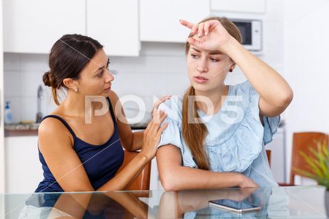 Portrait of upset young women discussing, quarrel at home kitchen indoor woman,conflict,consoling,depression,quarrel,talk,table,adult,girlfriends,ordinary,people,young,meeting,portrait,sitting,togetherness,women,home,cheerful,indoors,house,european,american,30s,25-30,together,friends,beautiful,indoor,kitchen,friendship,two,attractive,conversation,communion,angry,talking,quarreling,problems,dialogue,unhappy,worried