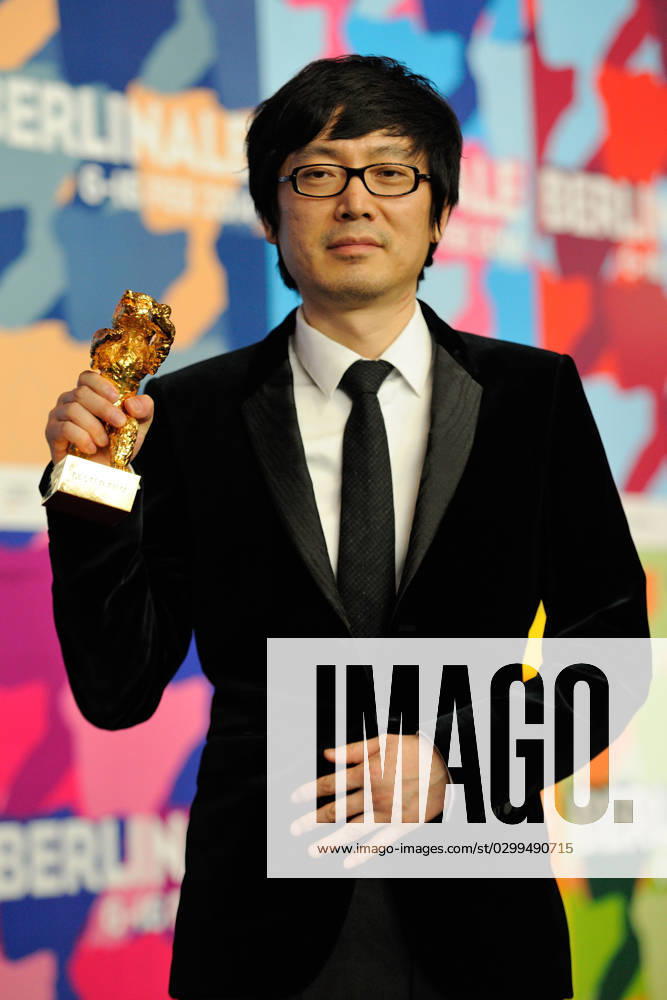 64th Berlinale Winners Press Conference Chinese director Diao Yinan poses with the Golden Bear for Best Film attending the Winners Press Conference during the 64th Berlinale, Berlin International Film Festival in Berlin, Germany, on February 15, 2014. Photo by Aurore Marechal ABACAPRESS.COM Berlin Germany