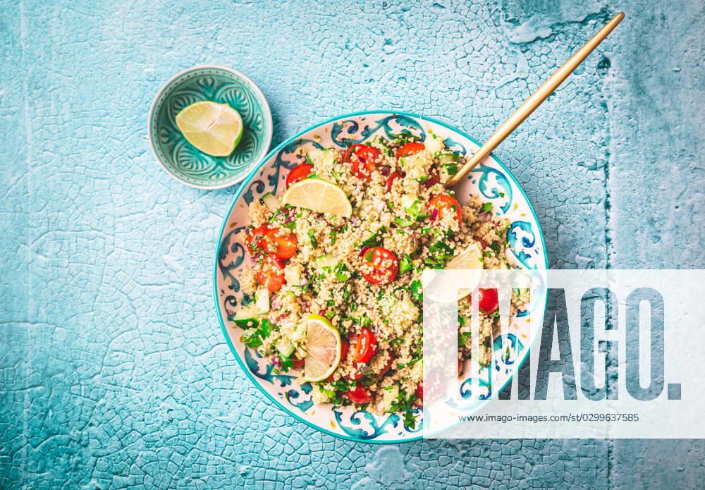 Tabbouleh salad Tabbouleh salad, traditional middle eastern and arab dish. Levantine vegetarian salad with parsley, mint, bulgur, tomato and cucumber