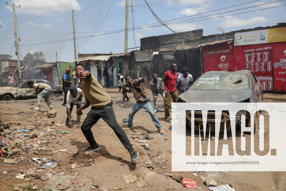 Protesters throw stones at police during the day two of a protest called Azimio party leader Raila Odinga over the high cost of living in Kibera Slums. Nairobi Kenya - ZUMAs197 20230720_zaa_s197_095