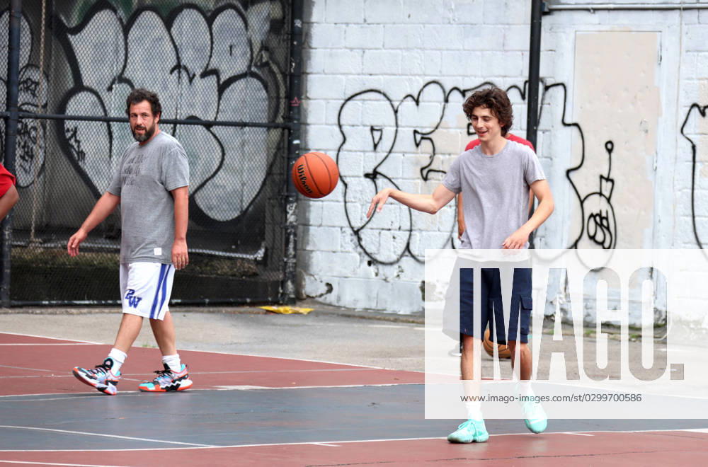 Adam Sandler and Timothee Chalamet Playing Basketball - NYC Actors Adam Sandler and Timothee Chalamet are playing basketball together with some friends in Soho, New York City, NY USA on July 20, 2023. Photo by Dylan Travis ABACAPRESS.COM New York City NY United States