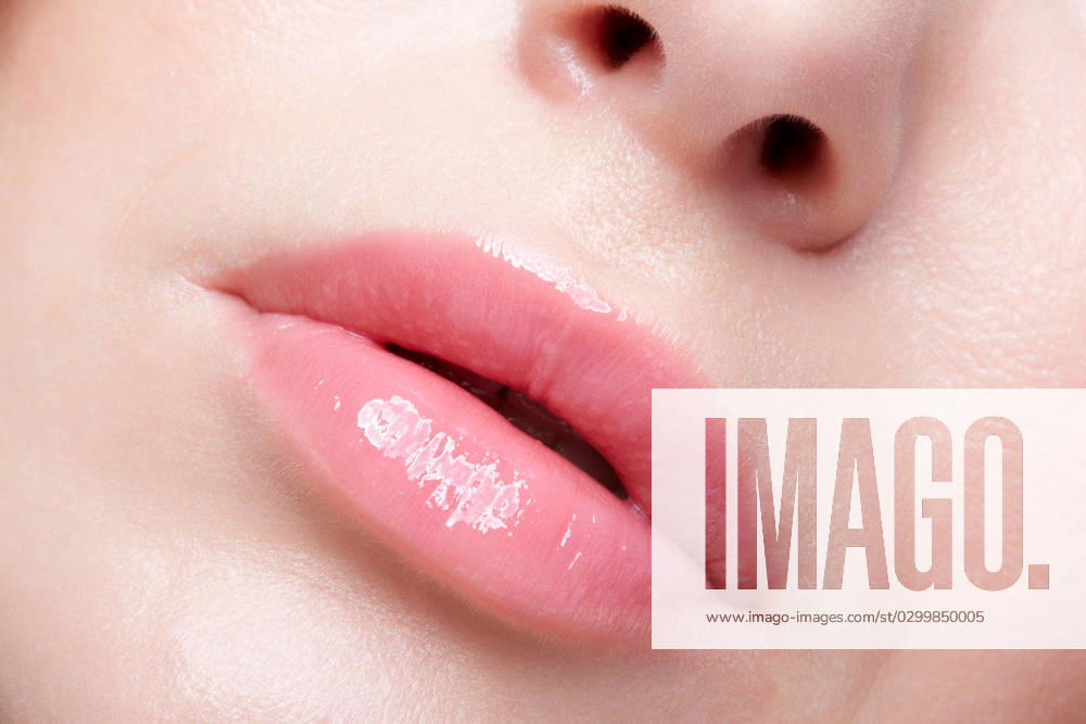 Closeup macro portrait of female part of face. Human woman lips with day beauty makeup Human mouth and nose. Closeup macro portrait of female part of face. Woman lips with day beauty makeup. ,model released, Symbolfoto