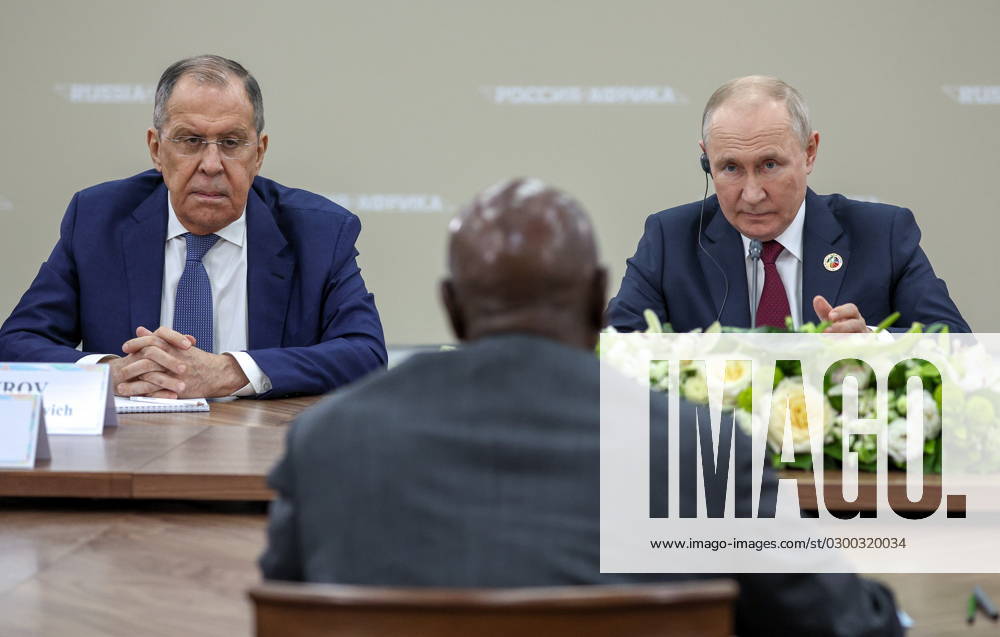 RUSSIA, ST PETERSBURG - JULY 27, 2023: Russia s President Vladimir Putin and Foreign Minister Sergei Lavrov (R-L) during a meeting with Uganda s President Yoweri Museveni on the sidelines of the second Russia-Africa Summit at the Expoforum Convention and Exhibition Centre. Vyacheslav Prokofyev TASS Host Photo Agency 60707393